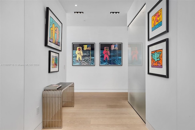 2675 S Bayshore Dr Unit 1602S, Miami, FL 33133 - corridor with wood finished floors, baseboards, and recessed lighting