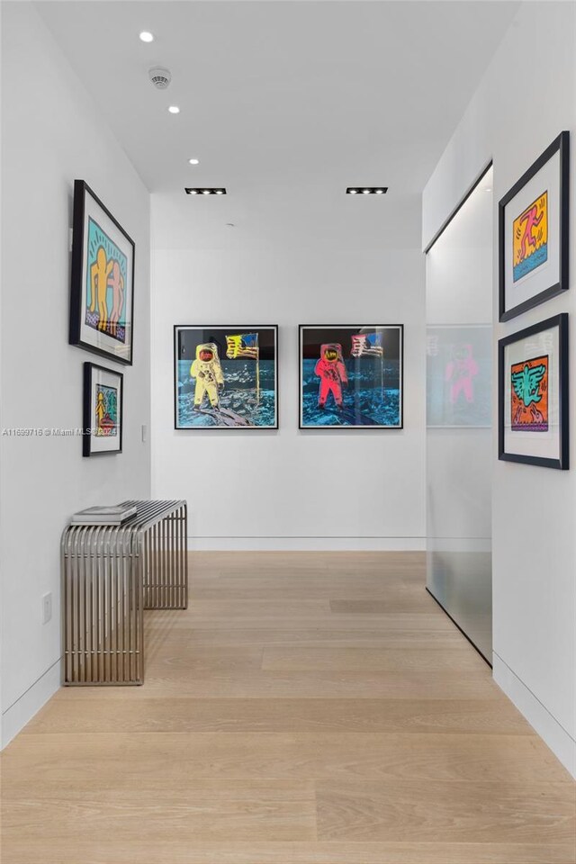 2675 S Bayshore Dr Unit 1602S, Miami, FL 33133 - corridor featuring wood finished floors, recessed lighting, and baseboards