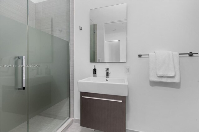 2675 S Bayshore Dr Unit 1602S, Miami, FL 33133 - bathroom with a shower stall and vanity