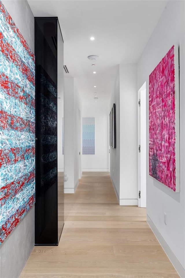 hall featuring light hardwood / wood-style flooring