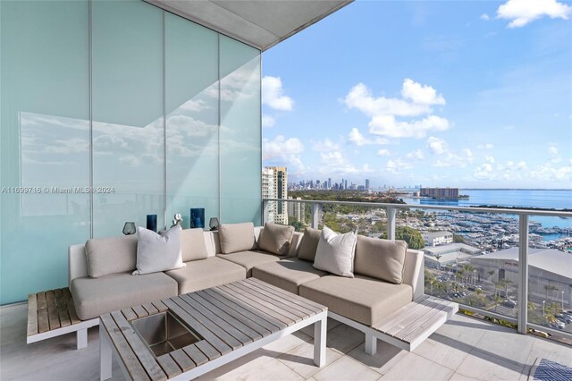 2675 S Bayshore Dr Unit 1602S, Miami, FL 33133 - balcony with outdoor lounge area, a city view, and a water view