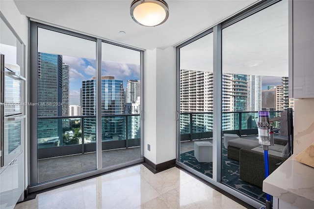 interior space featuring floor to ceiling windows