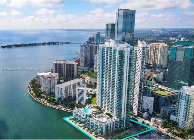 birds eye view of property featuring a water view