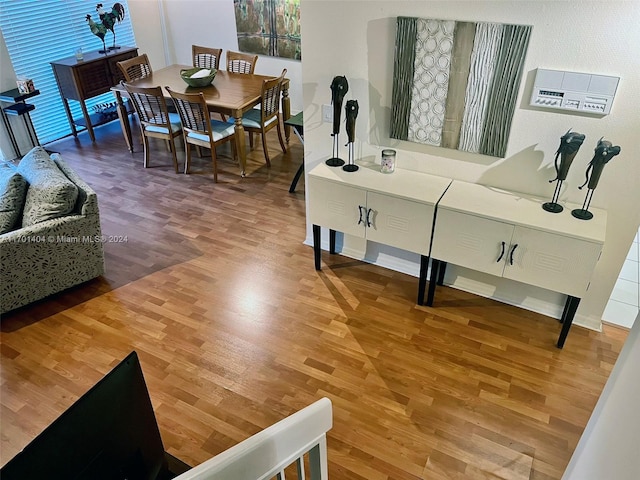 dining space featuring hardwood / wood-style flooring