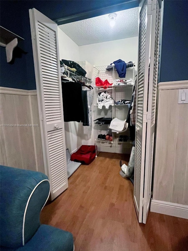 10244 NW 51st Ter, Doral, FL 33178 - spacious closet featuring wood finished floors
