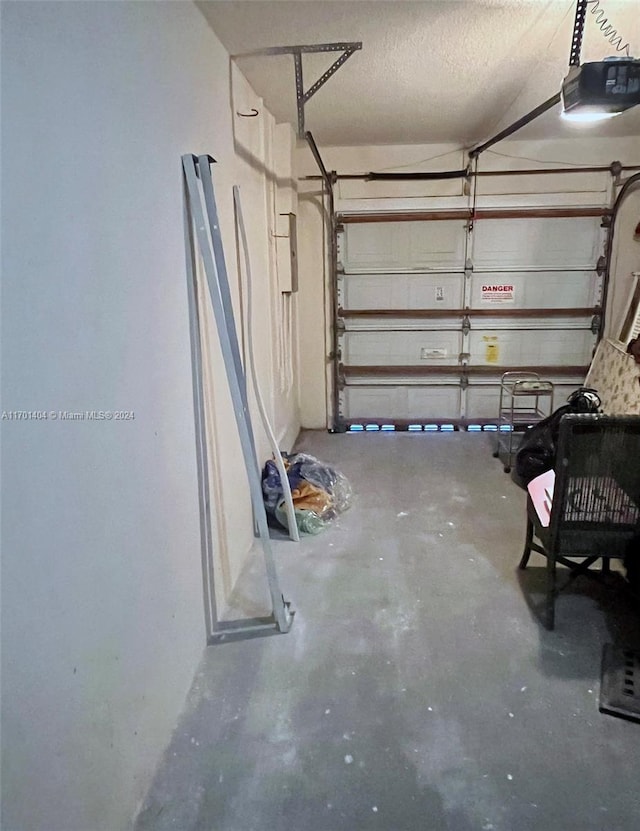 garage featuring a garage door opener