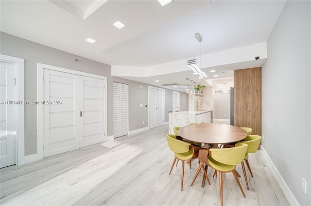 dining room featuring light hardwood / wood-style floors