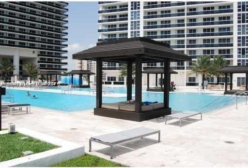 view of swimming pool featuring a gazebo