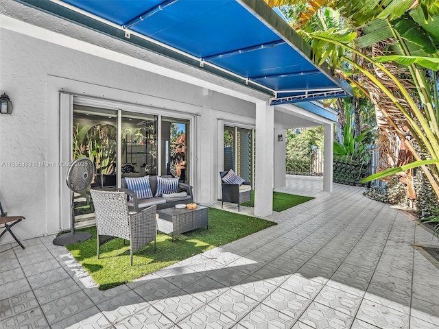 view of patio with an outdoor living space