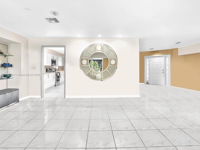 250 NE 212th St, Miami, FL 33179 - empty room featuring recessed lighting and light tile patterned flooring