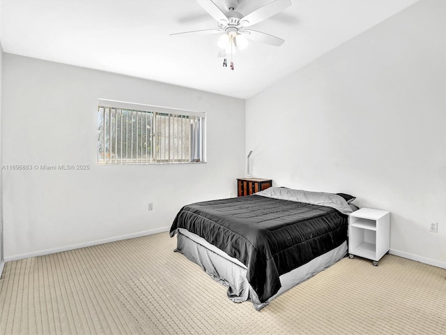 bedroom with carpet, a ceiling fan, and baseboards