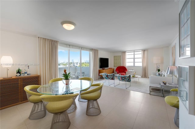 dining area with light tile patterned flooring