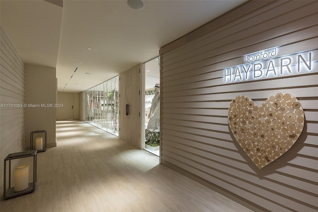 corridor featuring light hardwood / wood-style floors