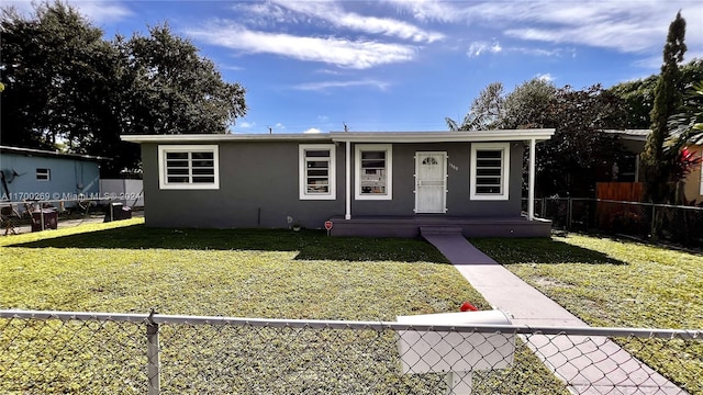 view of front of house featuring a porch and a front yard