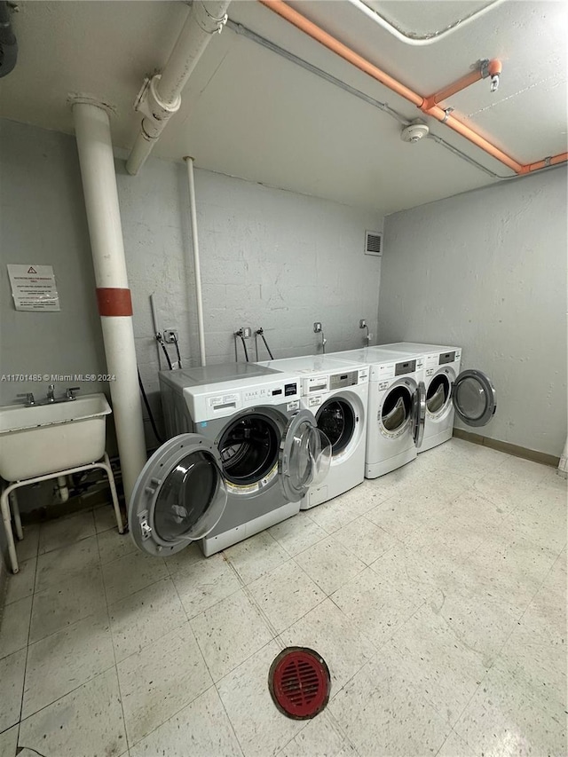 laundry area with washer and clothes dryer