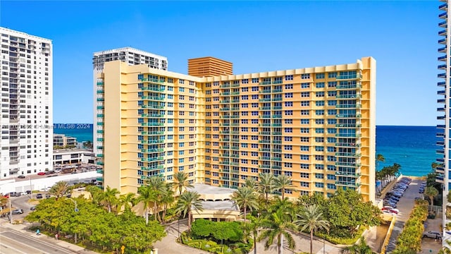 view of building exterior featuring a water view