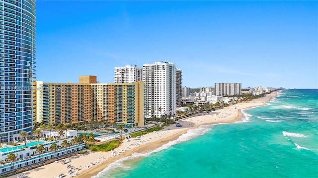 bird's eye view featuring a beach view and a water view