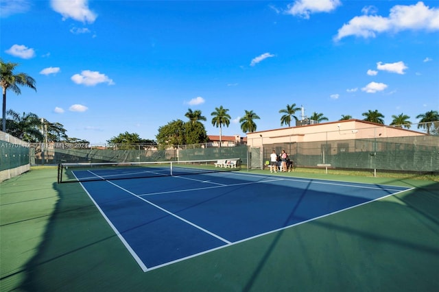 view of sport court featuring basketball hoop