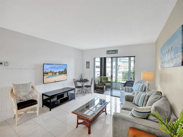 tiled living room with a textured ceiling