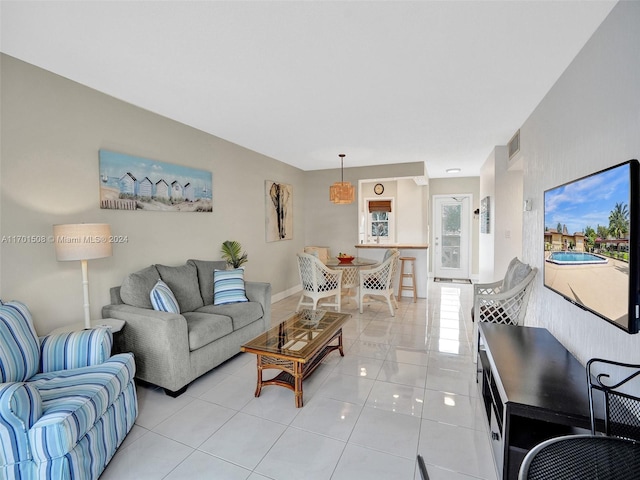 living room featuring light tile patterned flooring