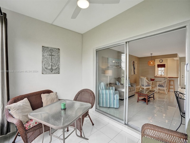 interior space with ceiling fan and sink