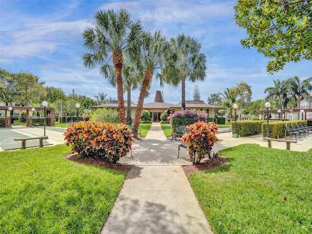 view of community featuring a lawn