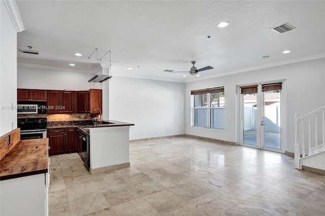 kitchen featuring ceiling fan, tasteful backsplash, crown molding, a textured ceiling, and black appliances