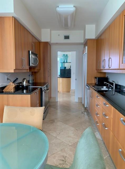 kitchen with sink and stainless steel appliances