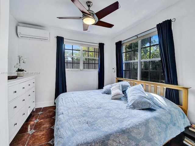 tiled bedroom featuring a wall mounted AC and ceiling fan