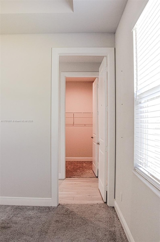 5231 NW Iredell St, Port St Lucie, FL 34986 - hall featuring light carpet and baseboards