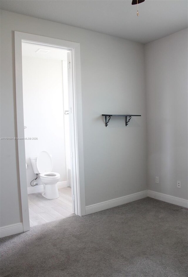 5231 NW Iredell St, Port St Lucie, FL 34986 - bathroom with a wealth of natural light, toilet, vanity, and a stall shower