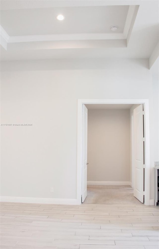5231 NW Iredell St, Port St Lucie, FL 34986 - unfurnished room featuring light wood finished floors, recessed lighting, a raised ceiling, baseboards, and a smoke detector