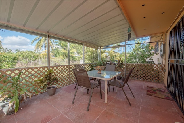 unfurnished sunroom featuring plenty of natural light