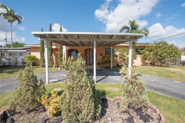 exterior space featuring a carport