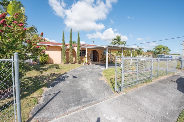 view of front of house featuring a carport