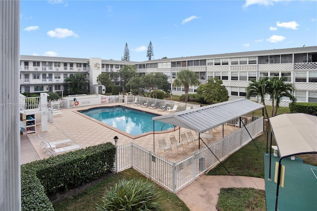 view of pool featuring a patio