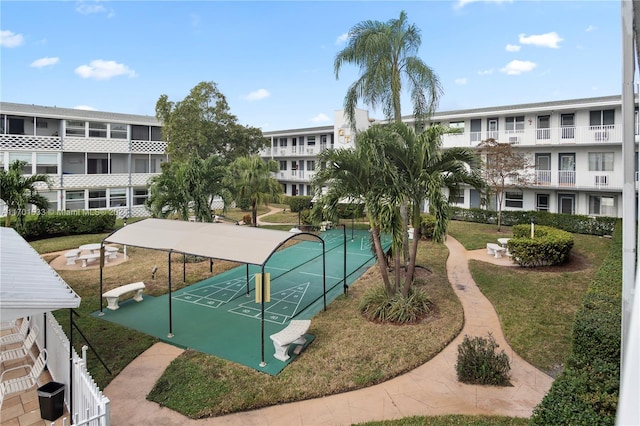 view of home's community featuring a yard