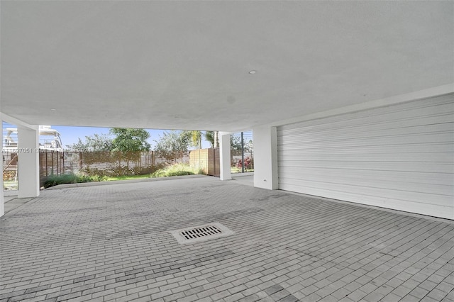 view of patio featuring a garage