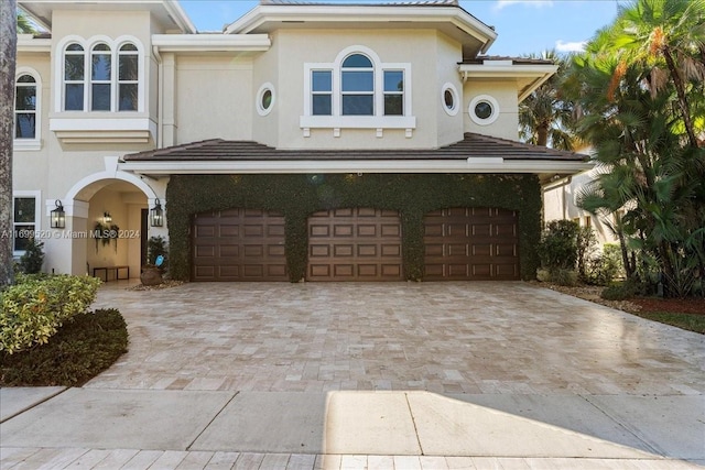 view of front of home with a garage