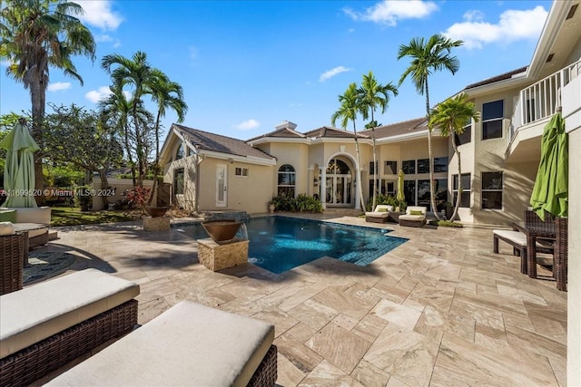 view of pool featuring a patio