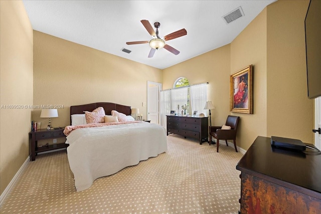 bedroom featuring light carpet and ceiling fan