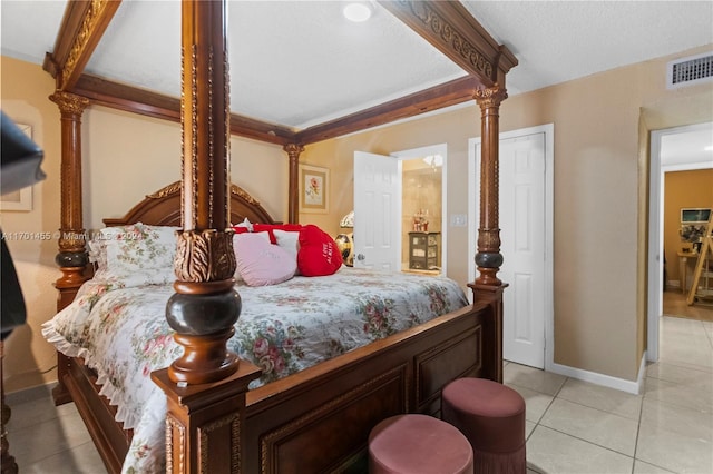 bedroom featuring light tile patterned floors