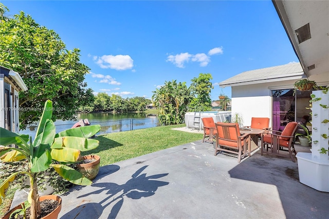 view of patio / terrace featuring a water view