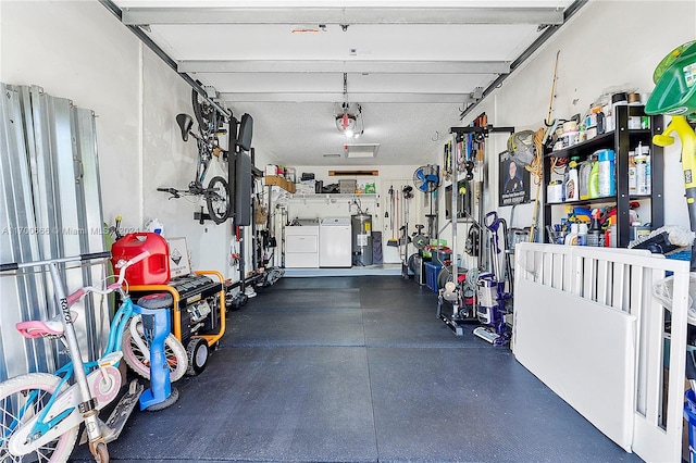 garage with washer and clothes dryer