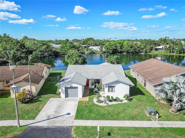 drone / aerial view featuring a water view