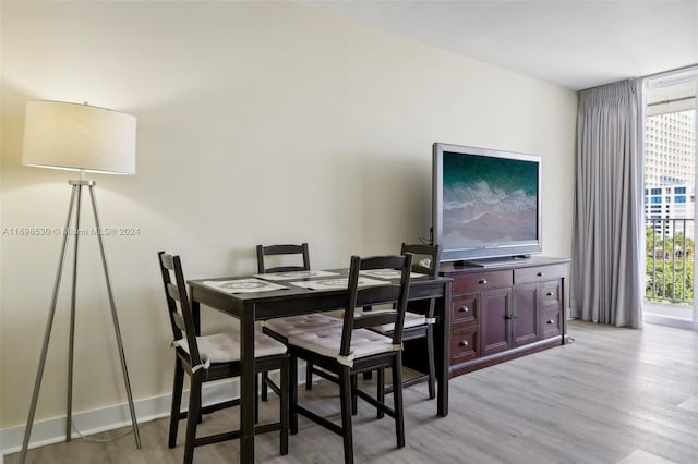 dining room with light hardwood / wood-style floors