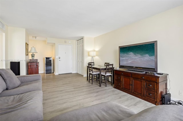 living room with light hardwood / wood-style floors