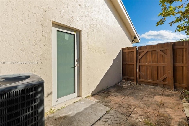 exterior space featuring central AC unit