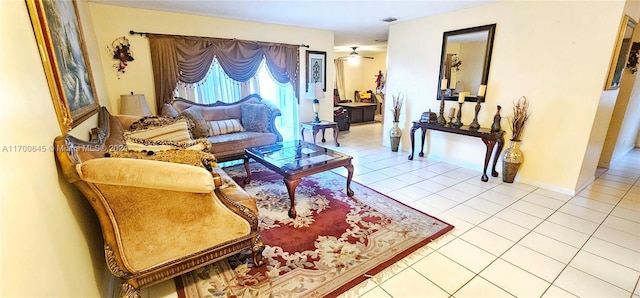 living room with tile patterned floors and ceiling fan