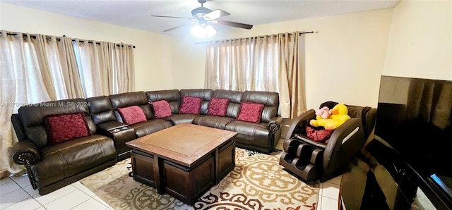 tiled living room with ceiling fan